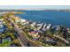 Close-up aerial perspective highlighting the home, pool, and waterfront location at 451 Bowdoin Cir, Sarasota, FL 34236