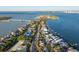 Aerial view of a home in a neighborhood by a long bridge over the water at 451 Bowdoin Cir, Sarasota, FL 34236