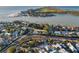 An aerial view of a home in a dense neighborhood, located near the water and beach at 451 Bowdoin Cir, Sarasota, FL 34236