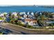 Exterior of a house with backyard pool and nearby construction at 451 Bowdoin Cir, Sarasota, FL 34236