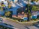 An aerial view of a house with a private pool in the backyard at 451 Bowdoin Cir, Sarasota, FL 34236