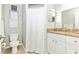 Bathroom with white vanity, granite countertop, and tiled flooring at 5304 Lemon Ave, Seffner, FL 33584