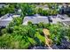 Single Gathering home with lush landscaping and a long driveway at 5345 Siesta Ct, Sarasota, FL 34242