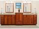 Elegant bathroom boasts double vanity with granite countertop and ample storage at 5345 Siesta Ct, Sarasota, FL 34242