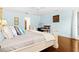 Main bedroom featuring hardwood floors and ensuite bathroom at 5345 Siesta Ct, Sarasota, FL 34242