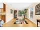 Bright dining room with hardwood floors and natural light at 5345 Siesta Ct, Sarasota, FL 34242