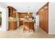 Spacious kitchen with granite countertops, island, and wood cabinets at 5345 Siesta Ct, Sarasota, FL 34242