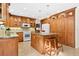 Eat-in kitchen with granite countertops and stainless steel appliances at 5345 Siesta Ct, Sarasota, FL 34242