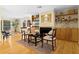 Living room with hardwood floors and built-in shelving at 5345 Siesta Ct, Sarasota, FL 34242