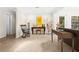 Living area with tile floors and rocking chair at 5345 Siesta Ct, Sarasota, FL 34242