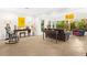 Bright sunroom with wicker furniture and tile floors at 5345 Siesta Ct, Sarasota, FL 34242