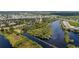 Panoramic aerial view of the riverfront community showcasing water access and lush landscaping at 5611 Key West Pl # 5611, Bradenton, FL 34203
