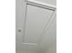 Ceiling hatch to the attic with visible pull string and trim at 5611 Key West Pl # 5611, Bradenton, FL 34203