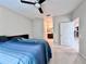 Comfortable bedroom with a ceiling fan and ensuite bathroom at 5611 Key West Pl # 5611, Bradenton, FL 34203