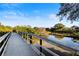 Scenic community bridge surrounded by lush vegetation, offering a peaceful retreat at 5611 Key West Pl # 5611, Bradenton, FL 34203