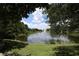 Scenic pond with a fountain, surrounded by lush landscaping at 5611 Key West Pl # 5611, Bradenton, FL 34203
