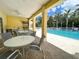 Pool area offers great space for relaxation and an outdoor kitchen with a barbecue grill at 5611 Key West Pl # 5611, Bradenton, FL 34203