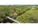 Picturesque boardwalk path alongside a calm river at 5611 Key West Pl # 5611, Bradenton, FL 34203