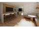 Open-concept dining area featuring counter seating and a breakfast nook with views of the kitchen at 5965 Gulf Of Mexico Dr, Longboat Key, FL 34228