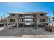 Under-construction coastal home with elevated architecture, beach views and natural light at 5965 Gulf Of Mexico Dr, Longboat Key, FL 34228