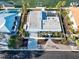 Bird's eye view of house, showcasing landscaping and driveway at 611 Ranger Ln, Longboat Key, FL 34228