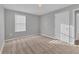Unfurnished bedroom with gray walls, brown carpet, and window blinds at 7005 57Th E Ter, Palmetto, FL 34221