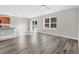 Open-concept living and dining area with sliding glass doors at 7005 57Th E Ter, Palmetto, FL 34221