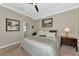 Bright bedroom with a king-size bed and ensuite bathroom access at 734 Foggy Morn Ln, Bradenton, FL 34212