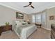 Large main bedroom with bay window and carpeted floor at 734 Foggy Morn Ln, Bradenton, FL 34212