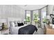 Cozy bedroom with a comfortable bed and ample natural light at 8020 Moonbeam Ave, Sarasota, FL 34241