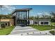 Modern clubhouse with welcoming entrance at 8020 Moonbeam Ave, Sarasota, FL 34241