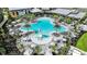Enjoy this freeform pool with water features and plenty of lounge chairs at 8020 Moonbeam Ave, Sarasota, FL 34241
