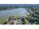 Aerial view showcasing house location near lake at 8334 Sailing Loop, Lakewood Ranch, FL 34202