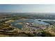 Aerial view of community, lake, and shopping at 8334 Sailing Loop, Lakewood Ranch, FL 34202