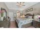 Main bedroom with king-size bed, and private bathroom access at 8334 Sailing Loop, Lakewood Ranch, FL 34202