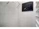 Small closet with white shelves and a chalkboard sign at 8334 Sailing Loop, Lakewood Ranch, FL 34202
