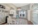 Home office with built-in shelving and a large window at 8334 Sailing Loop, Lakewood Ranch, FL 34202
