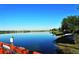 Calm lake view with homes in the background at 8334 Sailing Loop, Lakewood Ranch, FL 34202