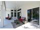 Spacious covered patio with comfortable seating at 8334 Sailing Loop, Lakewood Ranch, FL 34202