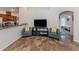 Comfortable living room with two armchairs and a large TV at 1296 Skagway Ter, North Port, FL 34291