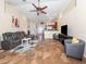 Spacious living room with sectional sofa and open floor plan at 1296 Skagway Ter, North Port, FL 34291