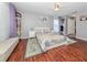 Spacious main bedroom with hardwood floors and plenty of natural light at 1296 Skagway Ter, North Port, FL 34291