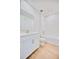 Modern bathroom with white vanity, tiled shower, and wood-look tile floor at 14010 Ginnie Springs Way, Parrish, FL 34219