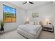 Well-appointed bedroom with modern decor, ample natural light, and a comfortable bed at 1521 Bay Rd, Sarasota, FL 34239