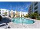 Community pool with ample space for lounging and soaking up the sun at 1709 N Tamiami Trl # 214, Sarasota, FL 34234