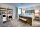 Spacious bedroom with king-size bed, desk area, and stylish decor at 1935 Gulf Of Mexico Dr # G7-302, Longboat Key, FL 34228