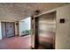 Building entry with elevator and private access at 1935 Gulf Of Mexico Dr # G7-302, Longboat Key, FL 34228