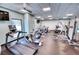 Well-equipped fitness center with treadmills, ellipticals, and weight machines at 1935 Gulf Of Mexico Dr # G7-302, Longboat Key, FL 34228