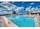 Inviting community pool with lounge chairs, perfect for relaxation and recreation at 1935 Gulf Of Mexico Dr # G7-302, Longboat Key, FL 34228