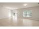 Spacious dining area filled with natural light and sliding glass doors leading to the backyard at 2080 Ellery St, Port Charlotte, FL 33952